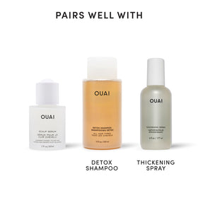 OUAI serum on fingertip illustrating lightweight feel and quick absorption