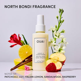 OUAI bottles held in hand for scale, shows full and mini size clarity