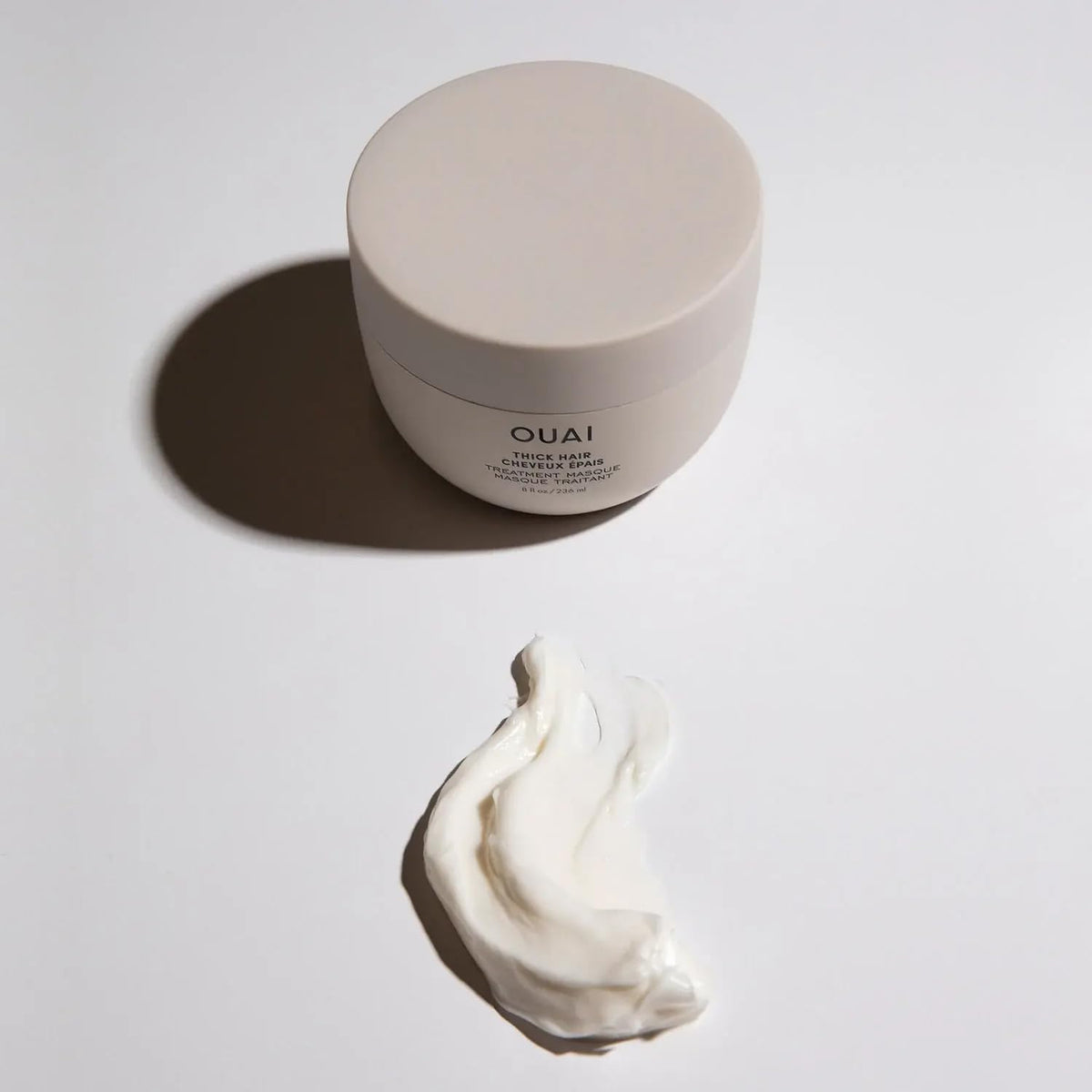 OUAI recyclable symbol on packaging emphasizing eco-friendly and recyclable benefit