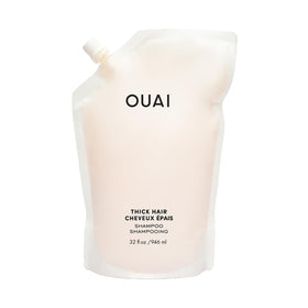 OUAI thick shampoo front packaging showing 32 oz refill benefits