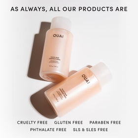 OUAI thick shampoo 32 oz held in hand showing scale and value