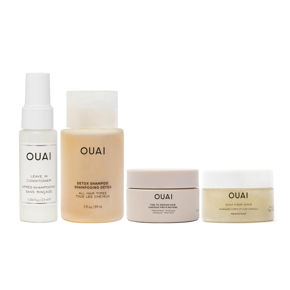 OUAI travel kit front packaging showing four travel-size products and benefits