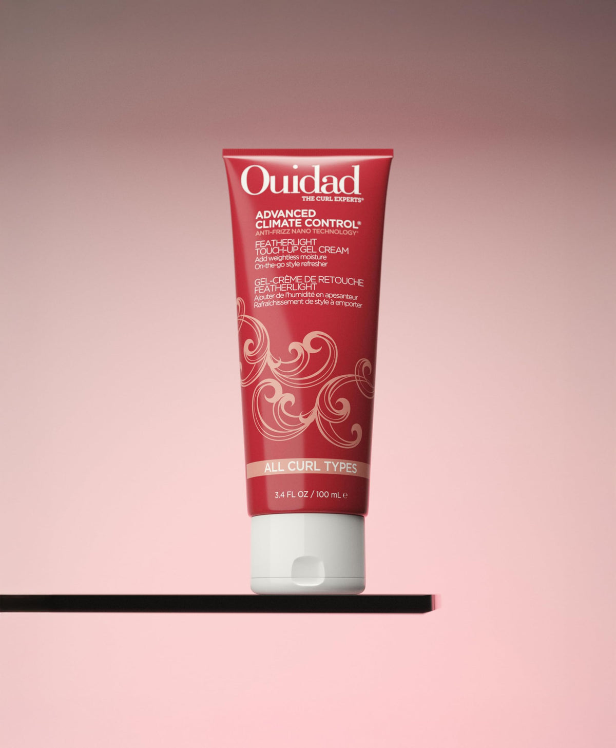 Ouidad applied to dry curls during styling to refresh and reduce frizz in minutes