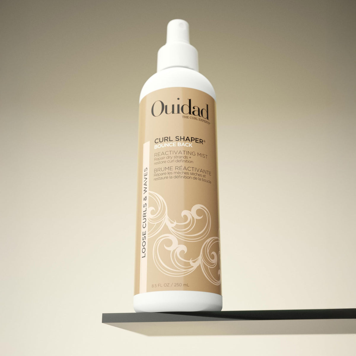 Ouidad before and after showing improved curl volume and definition