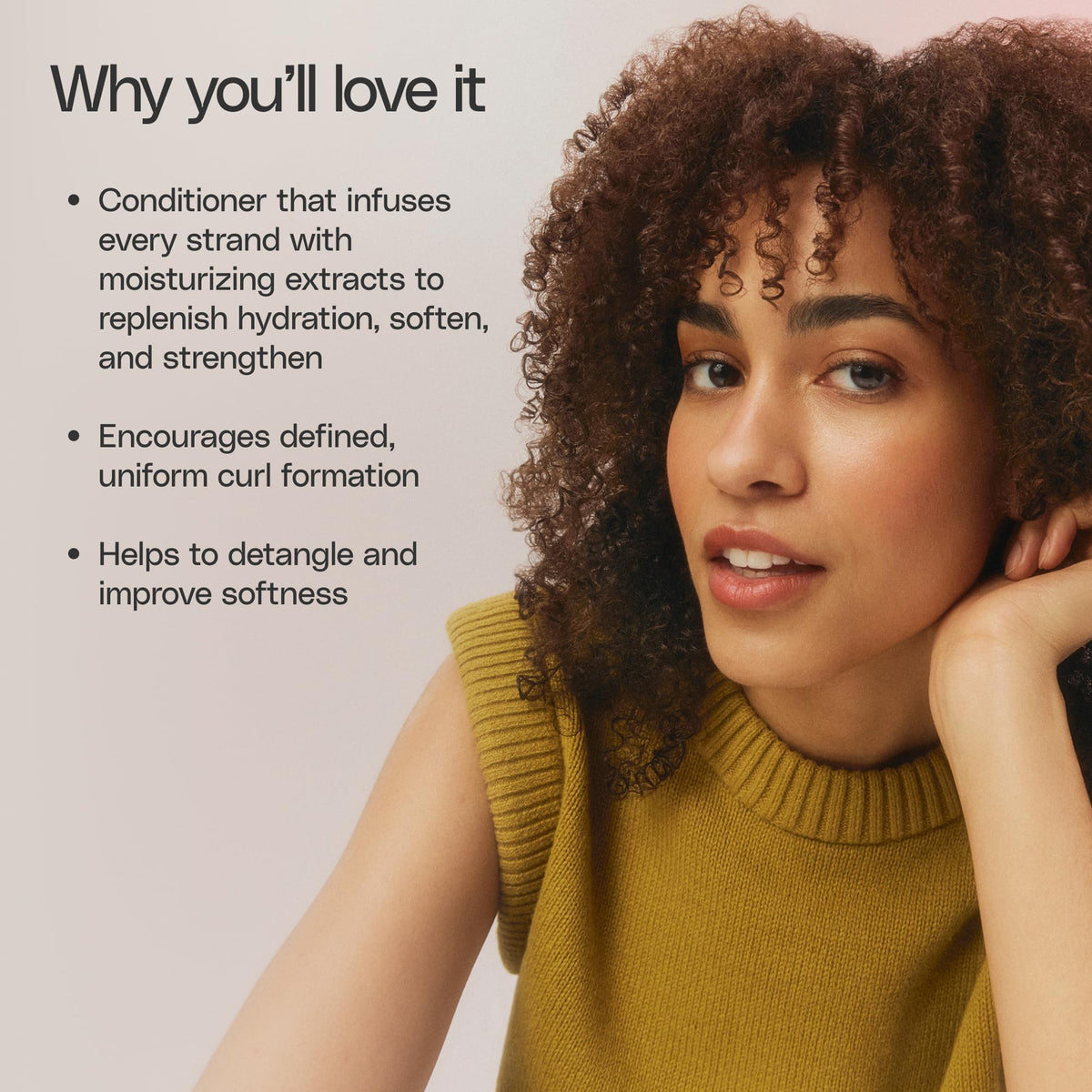 Ouidad conditioner being applied in shower to hydrate and soften tight curls