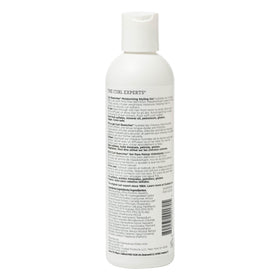 Ouidad bottle on bathroom shelf in natural setting showing everyday styling integration