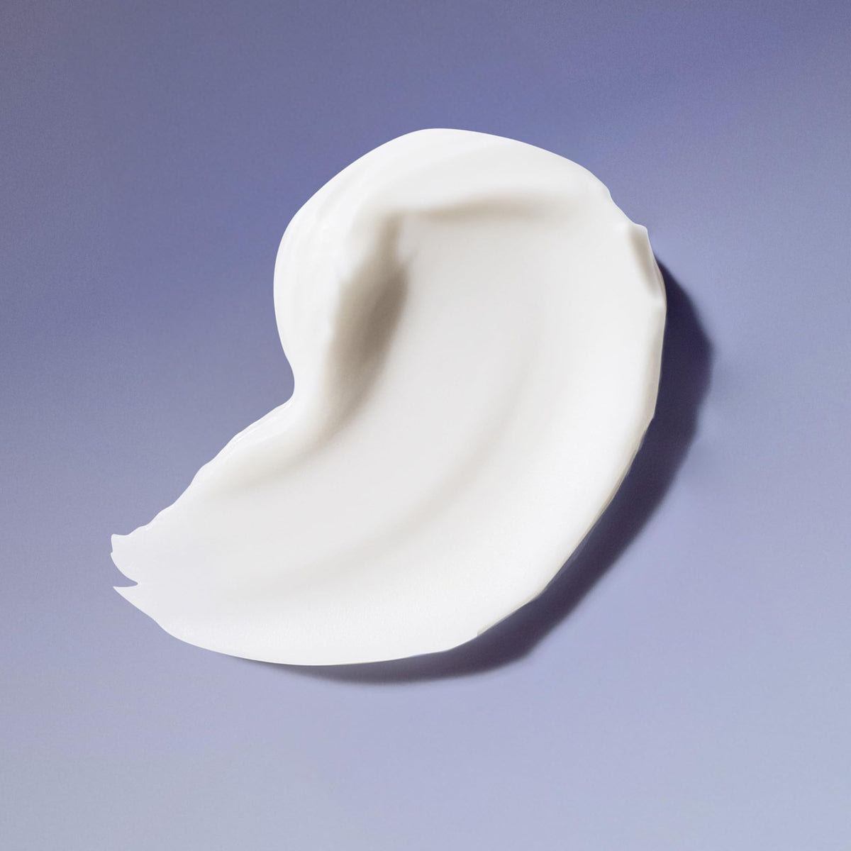 Ouidad shampoo foam close-up showing gentle lather for hydrated curls