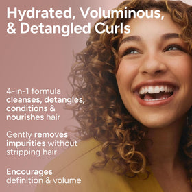 Ouidad detangling action with fingers through curls showing smoother definition