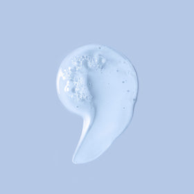 Ouidad ingredient label close-up listing bond-building and hydrating actives