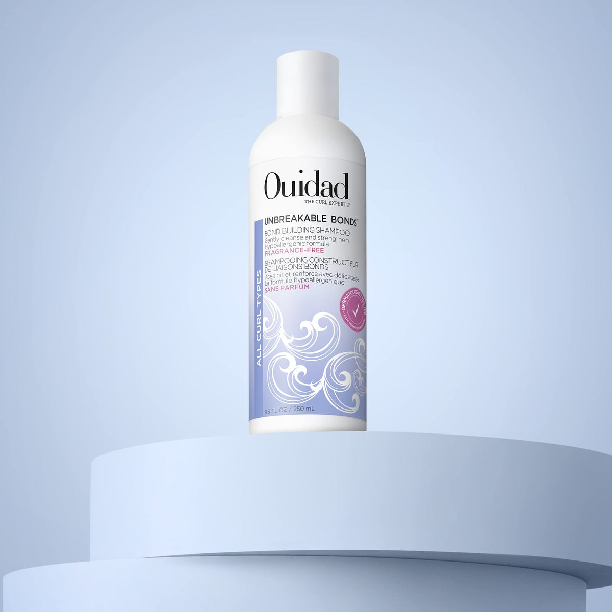 Ouidad lather on curly hair during wash showing improved curl definition