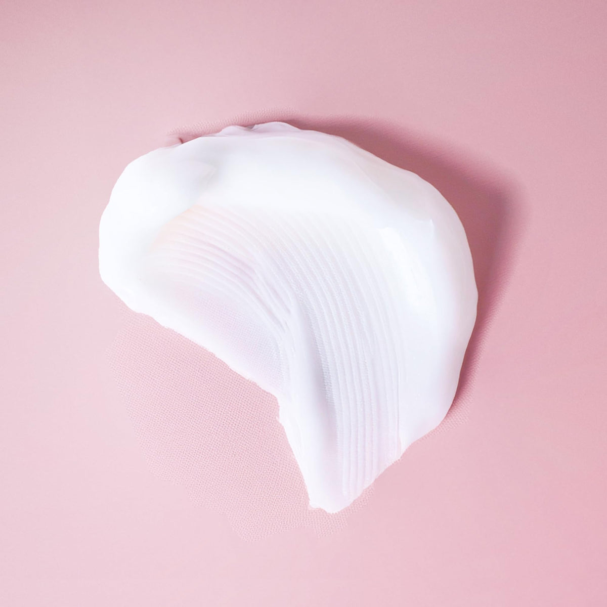 Ouidad on bathroom shelf in lifestyle scene signaling daily styling routine