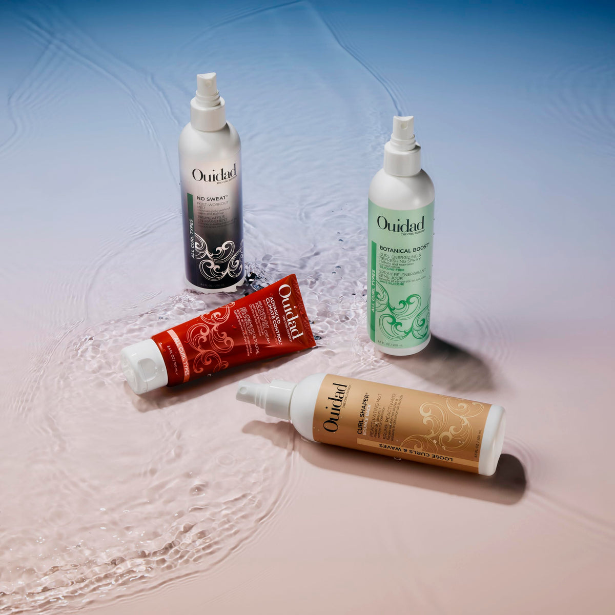 Ouidad tube inside travel bag in lifestyle scene conveying quick curl touch-ups while traveling