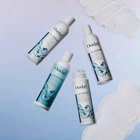 Ouidad refreshing second‑day curls demonstrating on‑the‑go curl revival