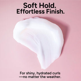 ouidad product next to hand demonstrating 5.7 fl oz size for portability and value