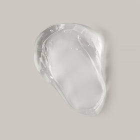 Ouidad clear gel texture close-up highlighting hydration and non-flake finish