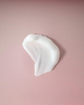Ouidad close-up of gel cream texture showing lightweight, non-greasy formula for soft hold
