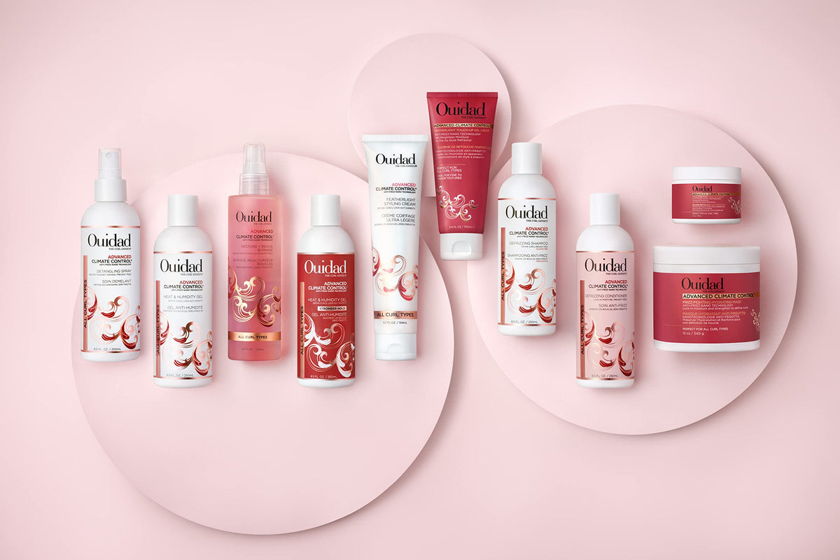 Ouidad balm in a purse lifestyle shot showing on-the-go refresh benefit