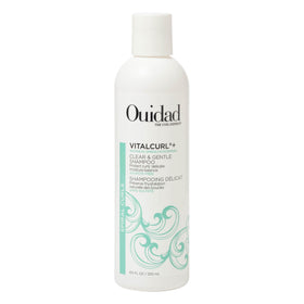 Ouidad bottle front view showing clean packaging and curl-friendly benefits
