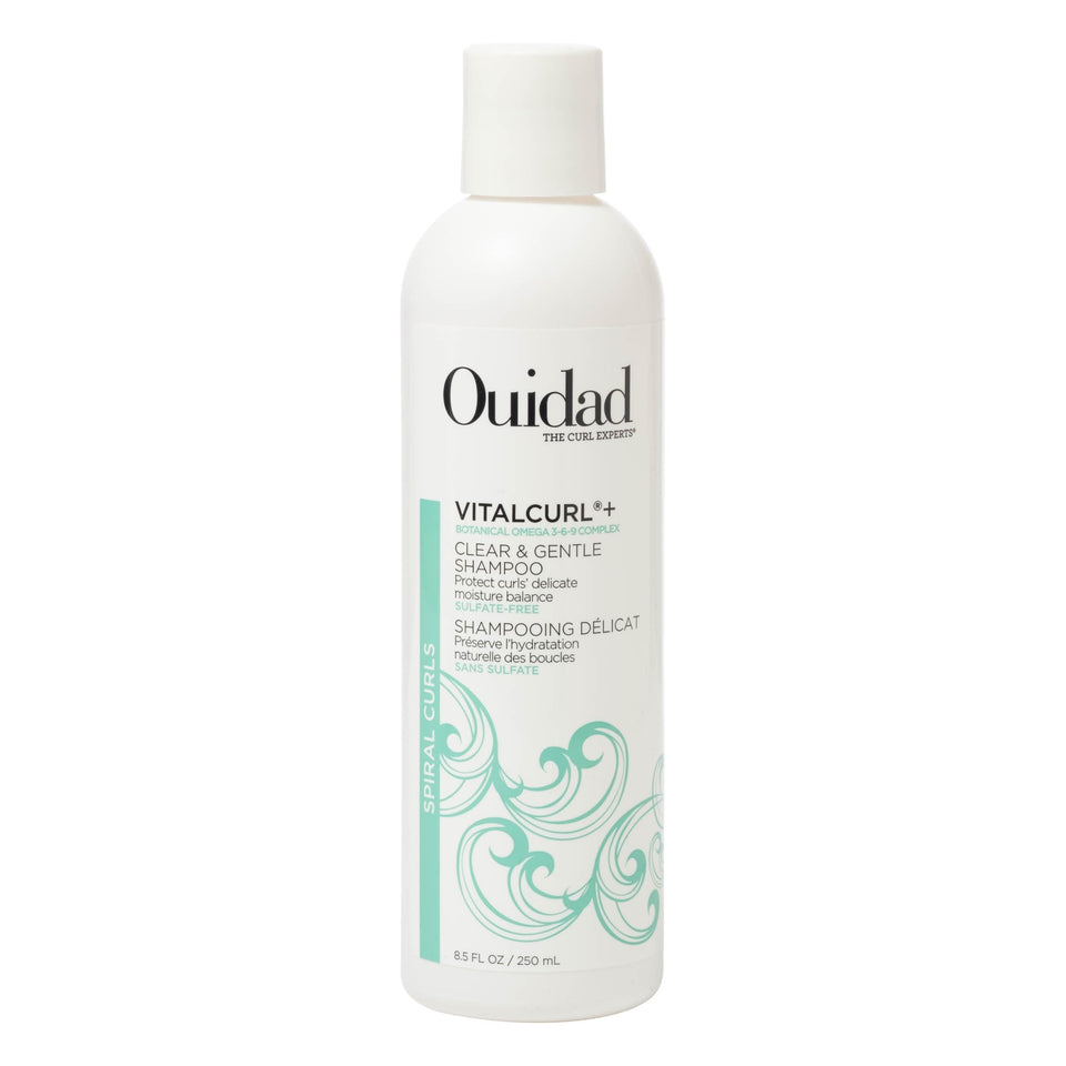 Ouidad bottle front view showing clean packaging and curl-friendly benefits