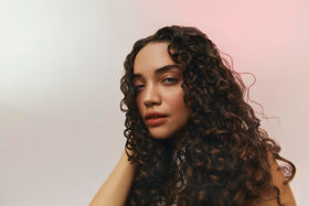 Ouidad VitalCurl texture close-up highlighting smooth, weightless consistency