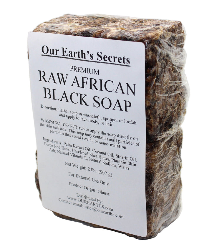 Our Earth's Secrets front view of 2 lb raw African black soap block showing packaging and size benefit
