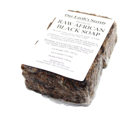 Our Earth's Secrets close-up of soap texture with plant particles highlighting natural ingredients benefit