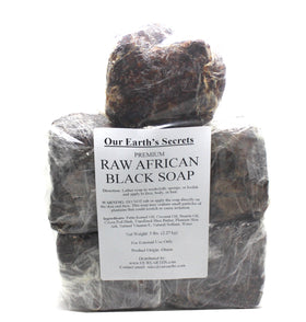 Our Earth's Secrets close-up of ingredients palm kernel oil cocoa pod ash and shea butter showing natural quality