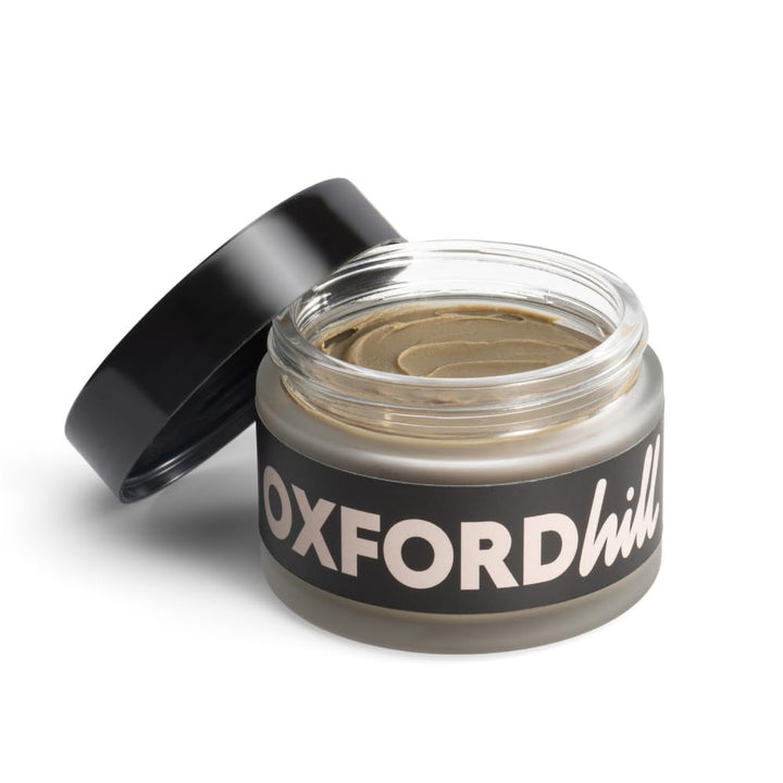 OXFORDhill front jar view showing clean matte packaging and benefit of simple formula
