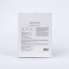 Hand holding OxygenCeuticals mask to show scale and single-use size