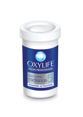 OxyLife tub with two Gulabari rose water bottles showing soothing prep