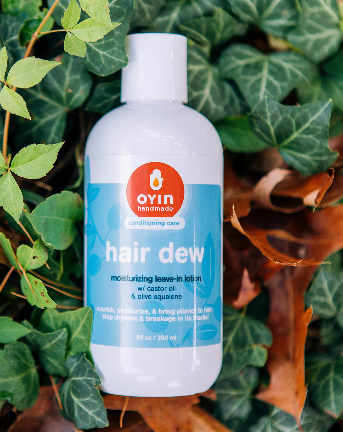 Oyin Handmade Hair Dew 33 oz pump bottle for easy, mess-free dispensing