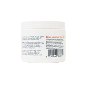 Close-up of Burnt Sugar Pomade texture by Oyin Handmade showing smooth, glossy balm and easy spreadability