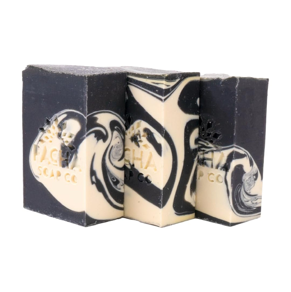 Pacha Soap Co front packaging showing charcoal bars and branding benefits