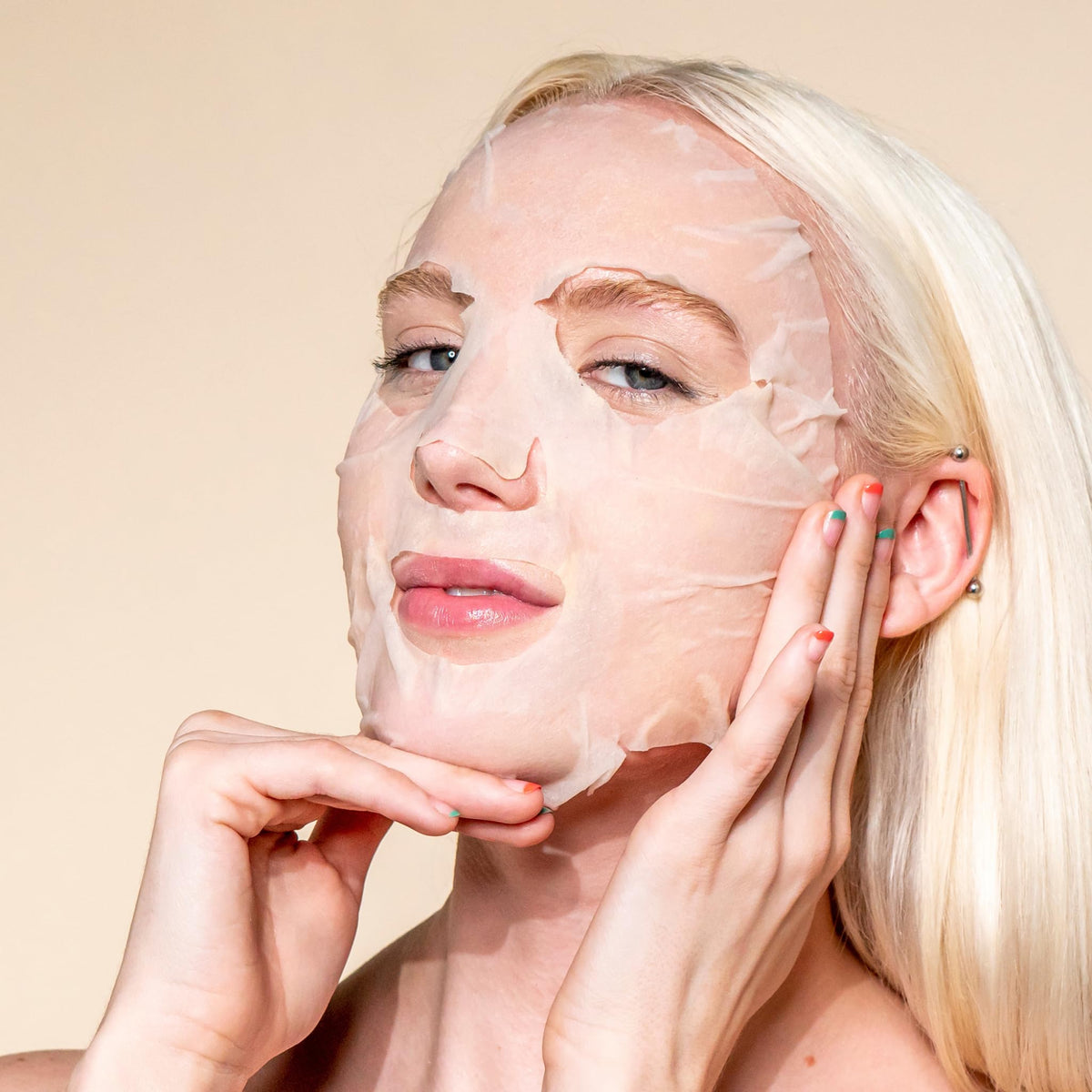 Pacifica mask applied on face demonstrating even serum delivery