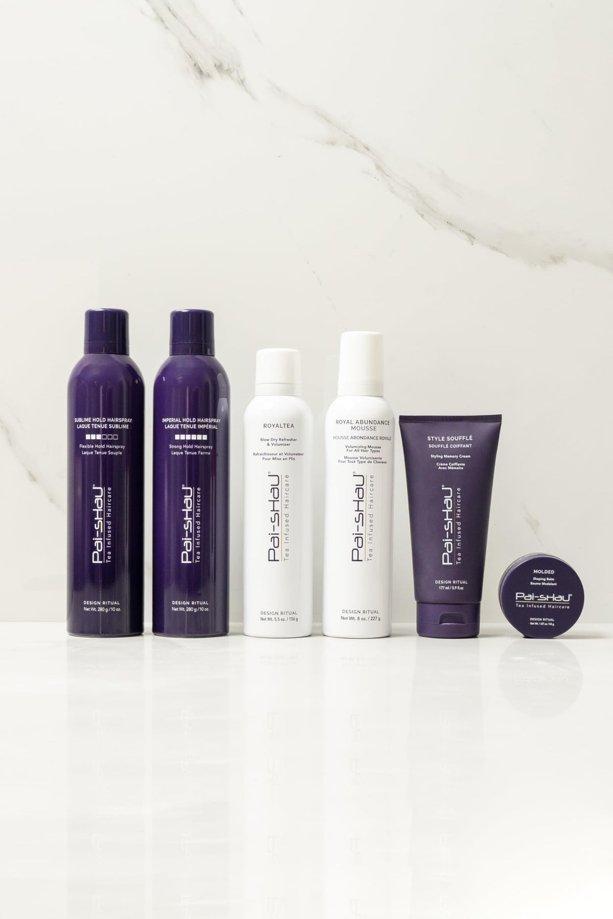 Pai-Shau serum applied to damp hair demonstrating smoothness and heat-protection benefit