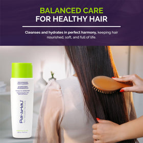 Pai-Shau shampoo being rinsed in shower for practical use benefit