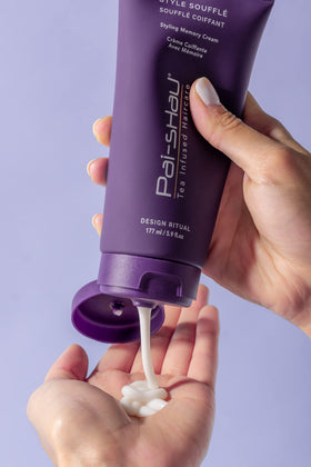 Pai-Shau being applied to damp hair to control frizz and shape natural volume