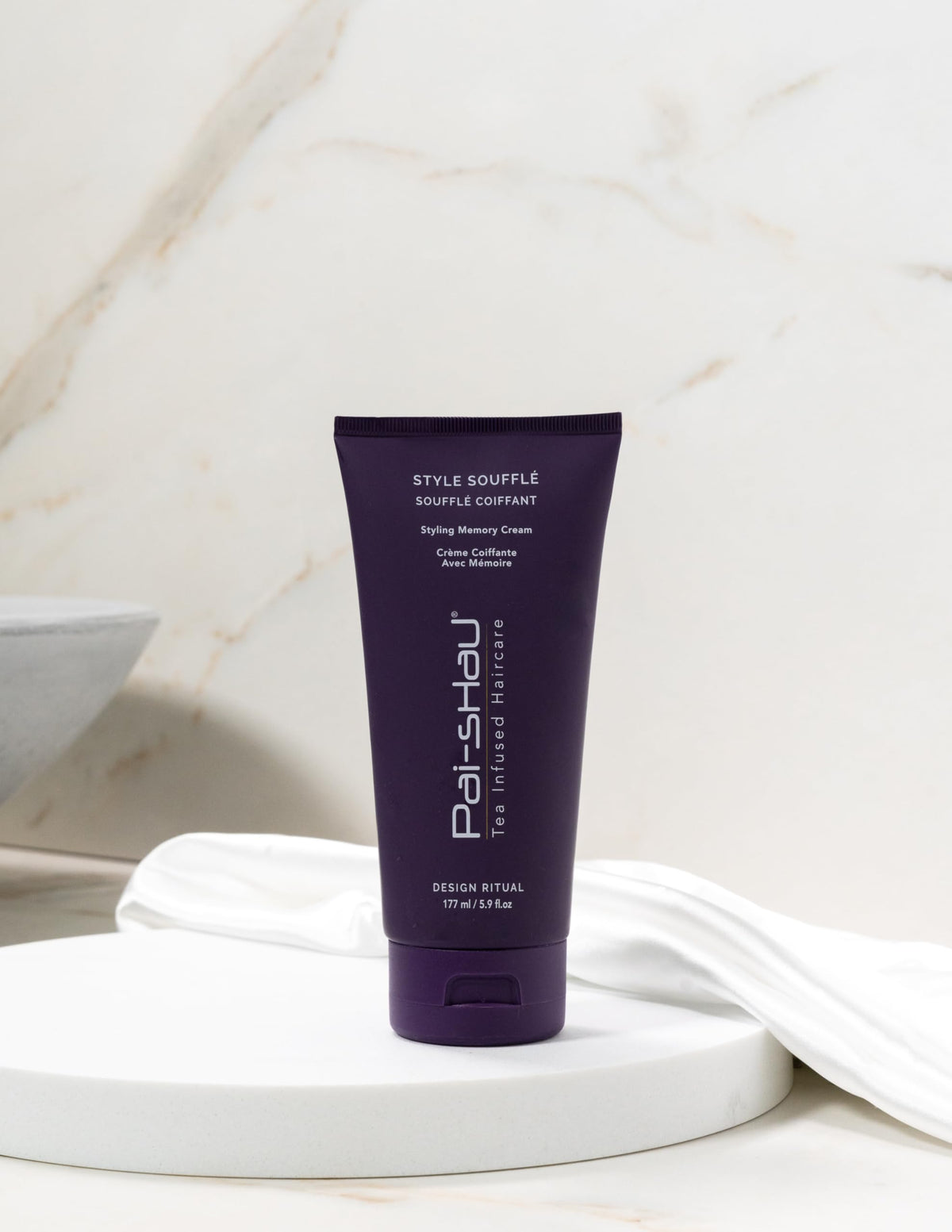 Pai-Shau cream texture close-up demonstrating smooth consistency for easy styling