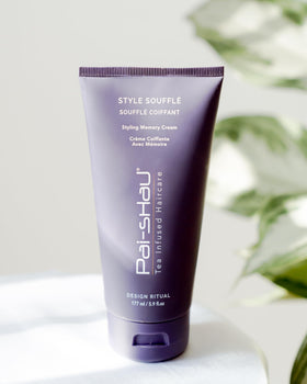 Pai-Shau on bathroom vanity styled with towel and brush suggesting everyday use