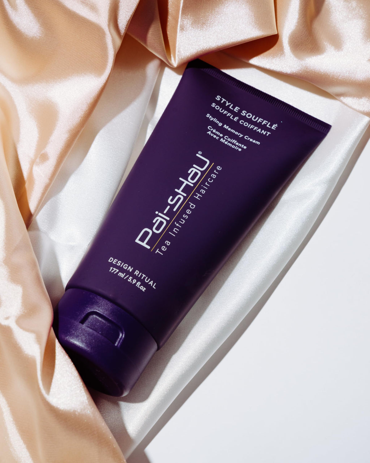 Pai-Shau jar in hand showing 5.9 fl oz size for travel-friendly convenience