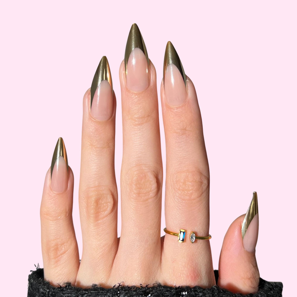 Hand applying PaintLab press on nail showcasing quick, secure adhesion step