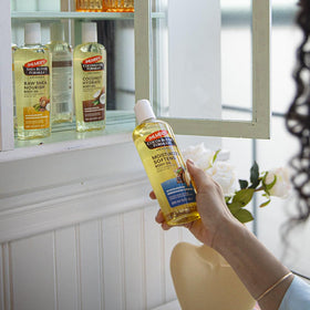 Palmer's oil applied to forearm showing fast absorption benefit