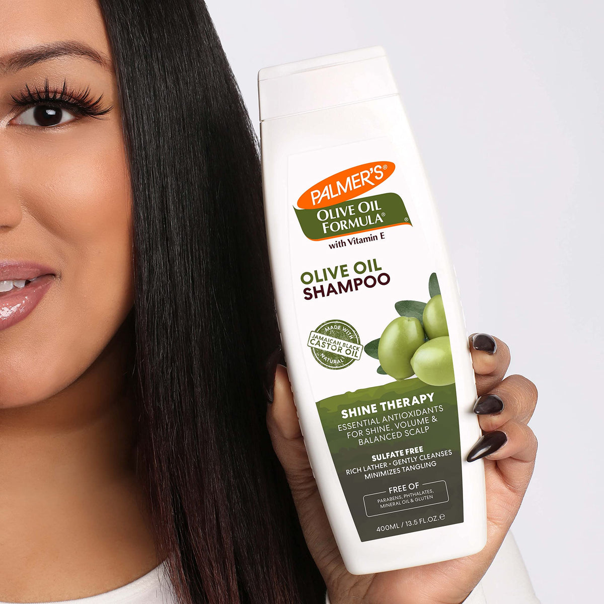 Palmer's shampoo in hand demonstrating application and control