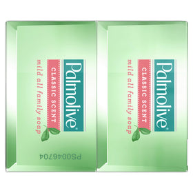 Palmolive bar next to a hand shows size and easy handling benefit