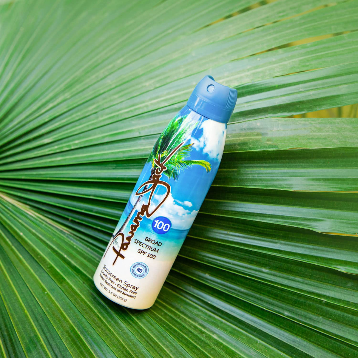 Panama Jack bottle in hand illustrating easy-grip convenience