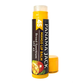 Panama Jack lip balms on a beach towel showing outdoor sun protection benefit