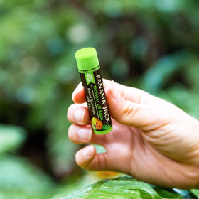 Panama Jack balm being applied to lips demonstrating even coverage benefit
