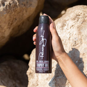 Panama Jack oil texture closeup highlighting smooth, lightweight formula that conditions skin