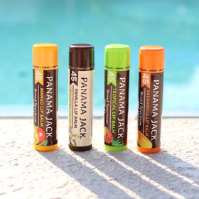Panama Jack close-up of four lip balm tubes highlighting smooth applicator benefit
