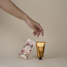 Panier des Sens on a vanity with rose petals giving a relaxing, fragrant care vibe